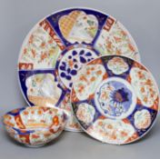 Two Imari dishes, largest 45cm., and an Imari bowl