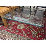 A Maison Jansen style square glass top brass coffee table on hoof feet, width 95cm, height 40cm