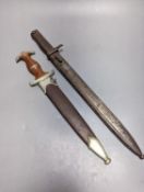 A Third Reich SA dagger within sheath, blade 22cm., and a bayonet within scabbard