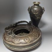 A Chinese bronze vase, 12cm., and an Islamic pierced brass lamp