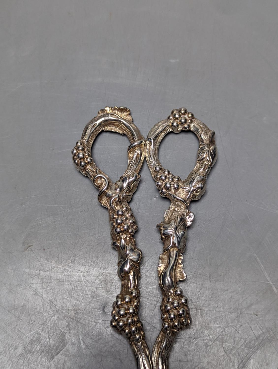 A pair of Victorian silver grape shears, London, 1844?, 18cm, gross 132 grams. - Image 2 of 3