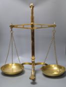 A pair of DeGrave & Co., London brass beam scales 59cm