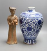 A large Chinese blue and white meiping and a Tang style pottery figure (2), vase37 cms high.