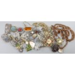 Assorted costume jewellery, including paste set brooches, necklace and earrings, Art Deco white