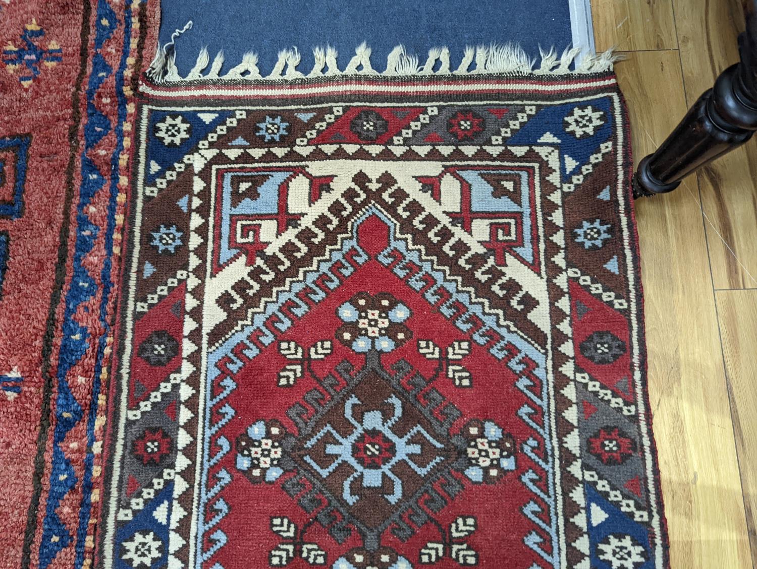 A Caucasian design red ground runner, 300 x 78cm - Image 5 of 5