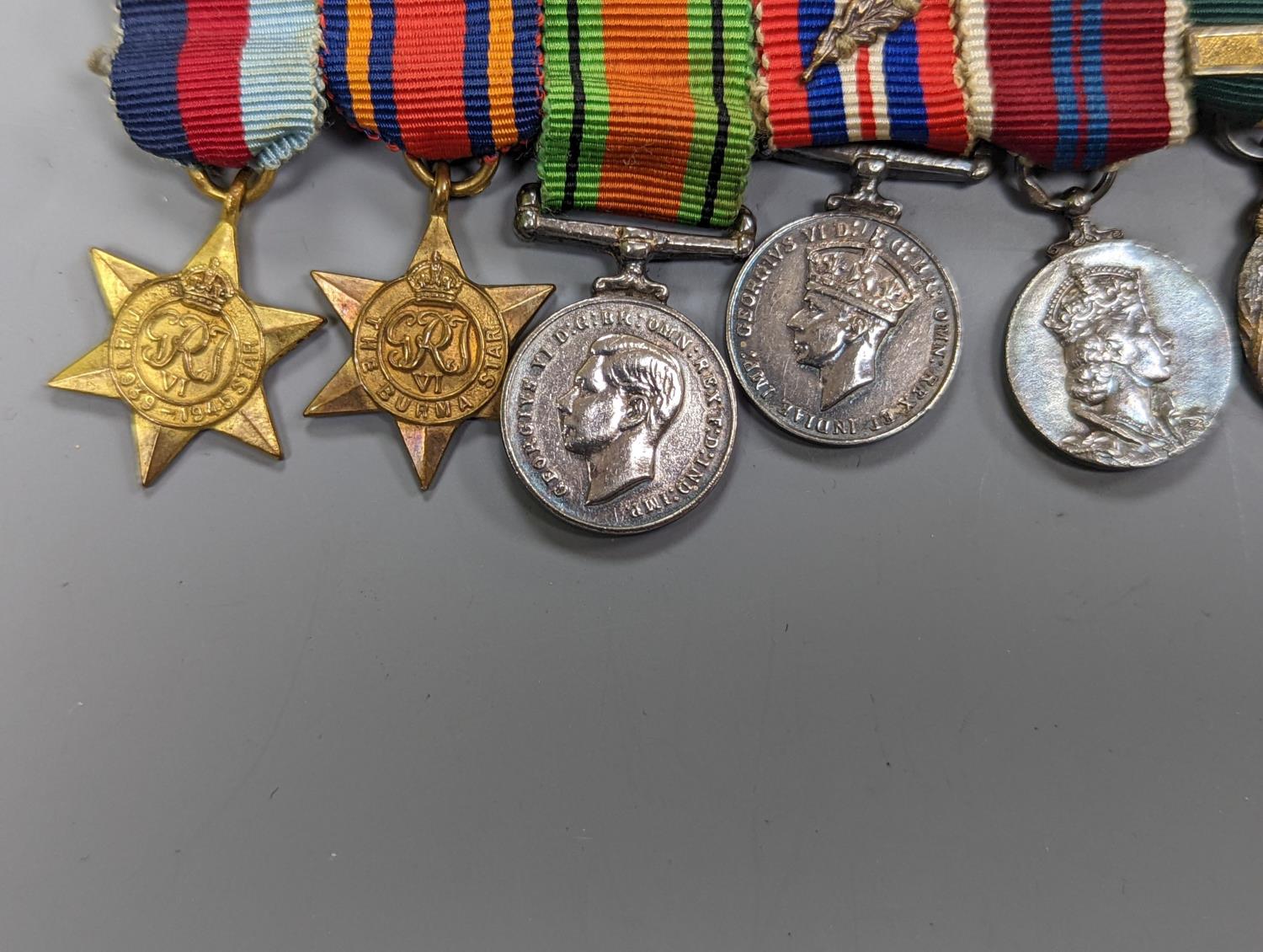 A WWII medal group of six, with miniatures, and a royal commemorative medal, 1937 - Image 7 of 15