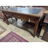 A Victorian Gothic style walnut two drawer library table, width 152cm, depth 78cm, height 76cm