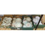 A large quantity of Susie Cooper tableware, Wedding Band, Tiger Lily and Blue Magnolia