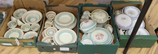 A large quantity of Susie Cooper tableware, Wedding Band, Tiger Lily and Blue Magnolia