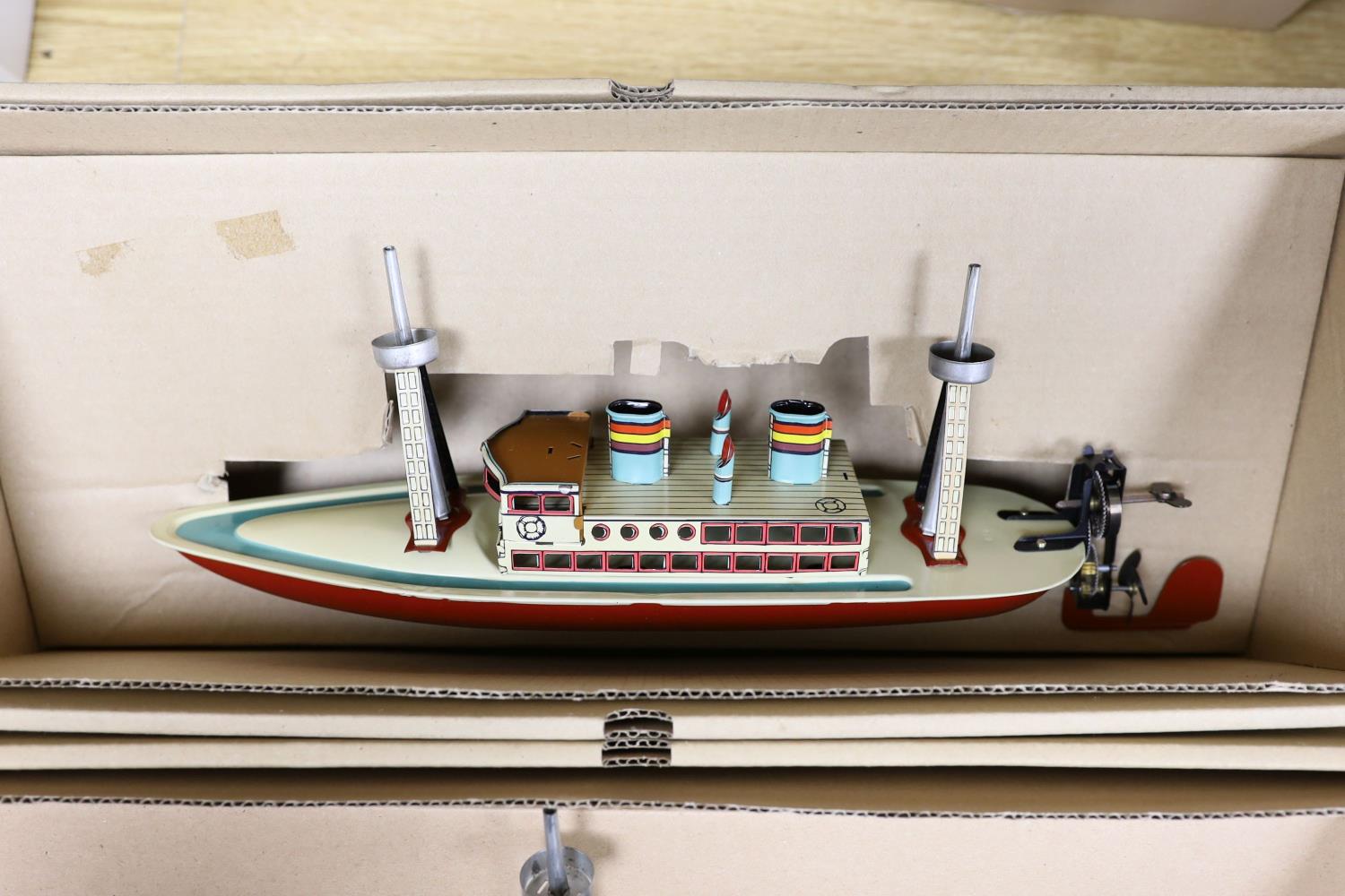 Three IBA tinplate boxed toys, two boats and a train,largest boat 42 cms wide. - Image 4 of 5