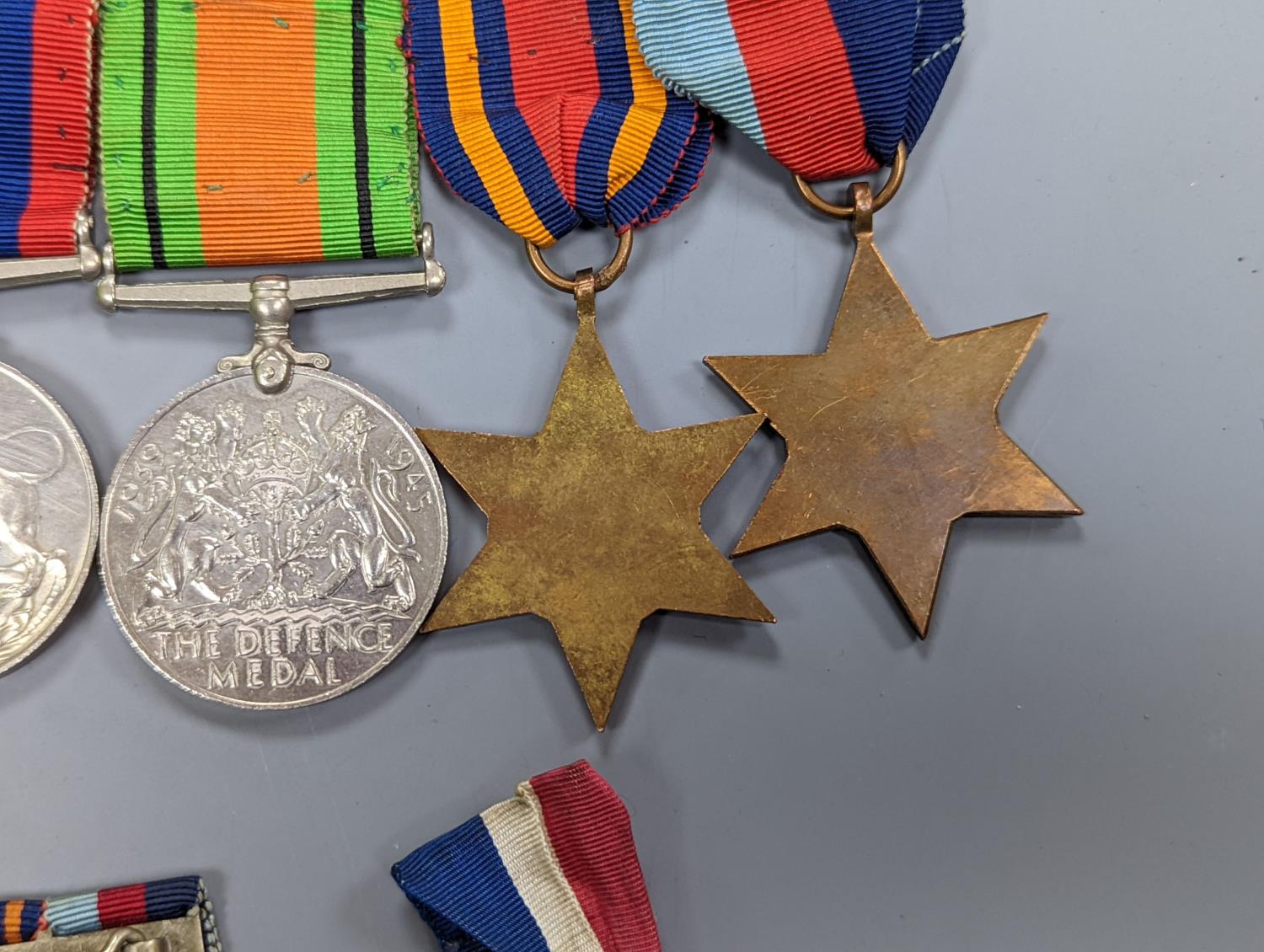 A WWII medal group of six, with miniatures, and a royal commemorative medal, 1937 - Image 11 of 15