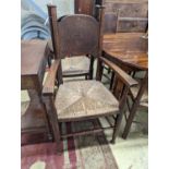 A set of six Arts & Crafts oak chairs, including a pair of carvers, in the Glasgow School manner