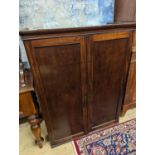 An early 19th century mahogany two door cabinet top section with pigeonhole interior, width 89cm,