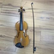 A violin and bow, various records etc