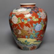 A large Japanese Kutani ovoid vase, painted with Buddhist Lions 36cm