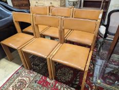 A set of eight mid century design walnut and tan leather dining chairs, width 48cm, depth 44cm,