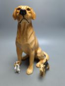 A large Royal Doulton figure of a seated Labrador (No. 2314), height 34cm, a small Beswick