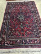 A Tabriz style red ground carpet, 290 x 190cm