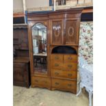 An Edwardian satinwood banded mahogany compactum wardrobe, length 136cm, depth 56cm, height 210cm