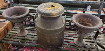 A pair of circular cast iron campana urns, diameter 29cm, height 35cm together with an iron milk