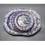 Eight pieces of early 19th century stone china dinnerware, including two graduated meat dishes (some