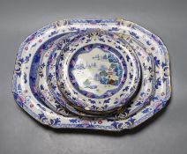Eight pieces of early 19th century stone china dinnerware, including two graduated meat dishes (some