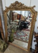 A 19th century French carved giltwood overmantel mirror, width 100cm, height 150cm