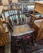 A mid 19th century Derbyshire area yew and elm Windsor elbow chair, width 57cm, depth 40cm, height