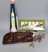 Boxed lithographed tinplate and clockwork toy rocket and various hollowcast lead toys and Bakelite