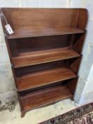 A George III style mahogany graduated open bookcase, width 77cm, depth 25cm, height 122cm