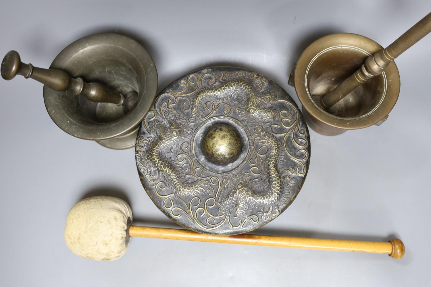 Two pestles and mortars and a Chinese gong with beater, gong 21 cms wide. - Image 2 of 5