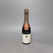 One half bottle of 1953 Louis Roederer extra dry champagne