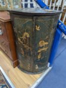 An 18th century Japanned lacquer bow front hanging corner cabinet, width 58cm, depth 39cm, height