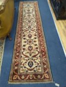 An Uzbek style rug, 320 x 84cm