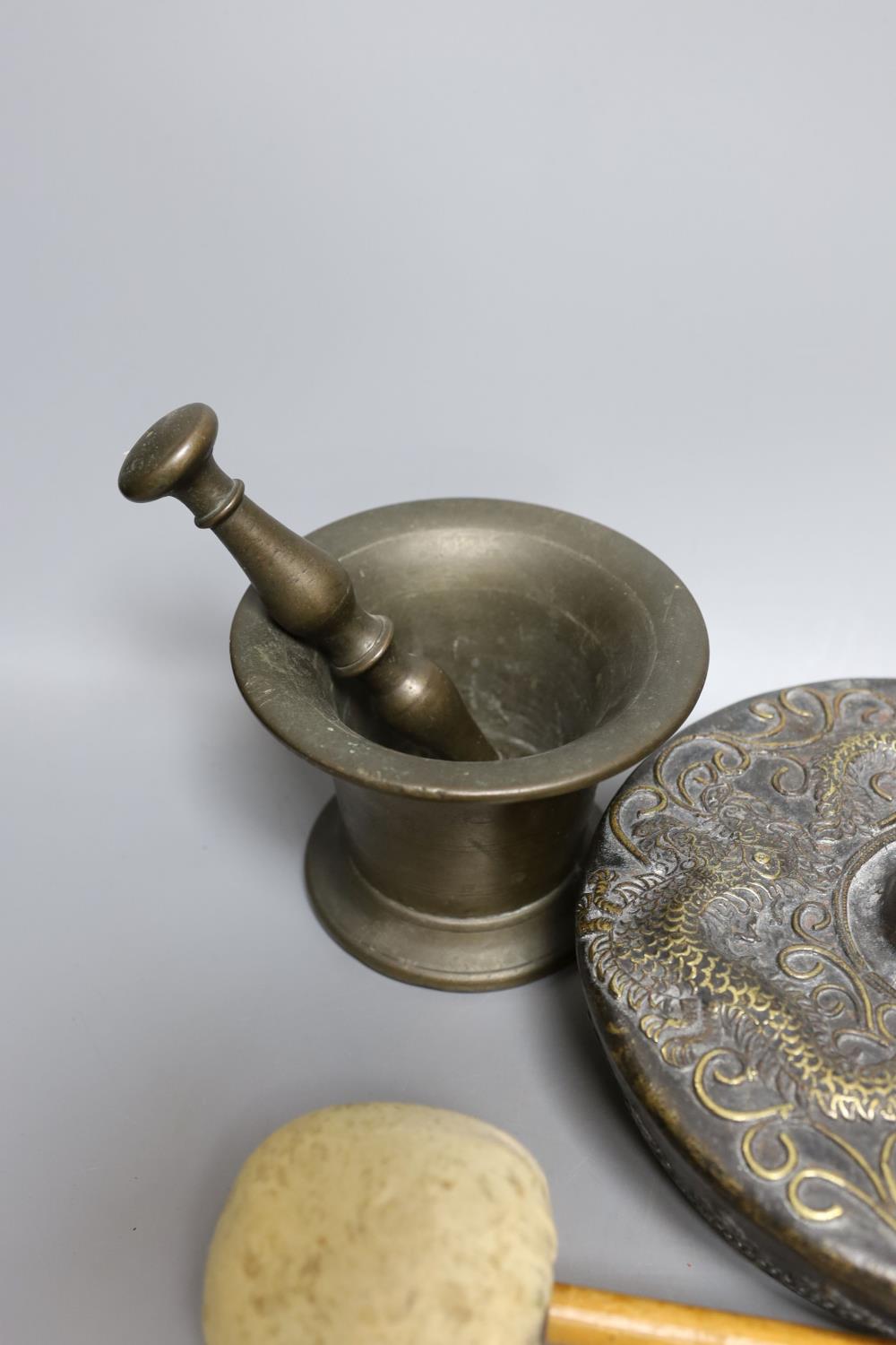 Two pestles and mortars and a Chinese gong with beater, gong 21 cms wide. - Image 4 of 5