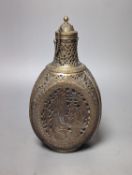 A Persian pierced brass cased glass dimple bottle 23cm