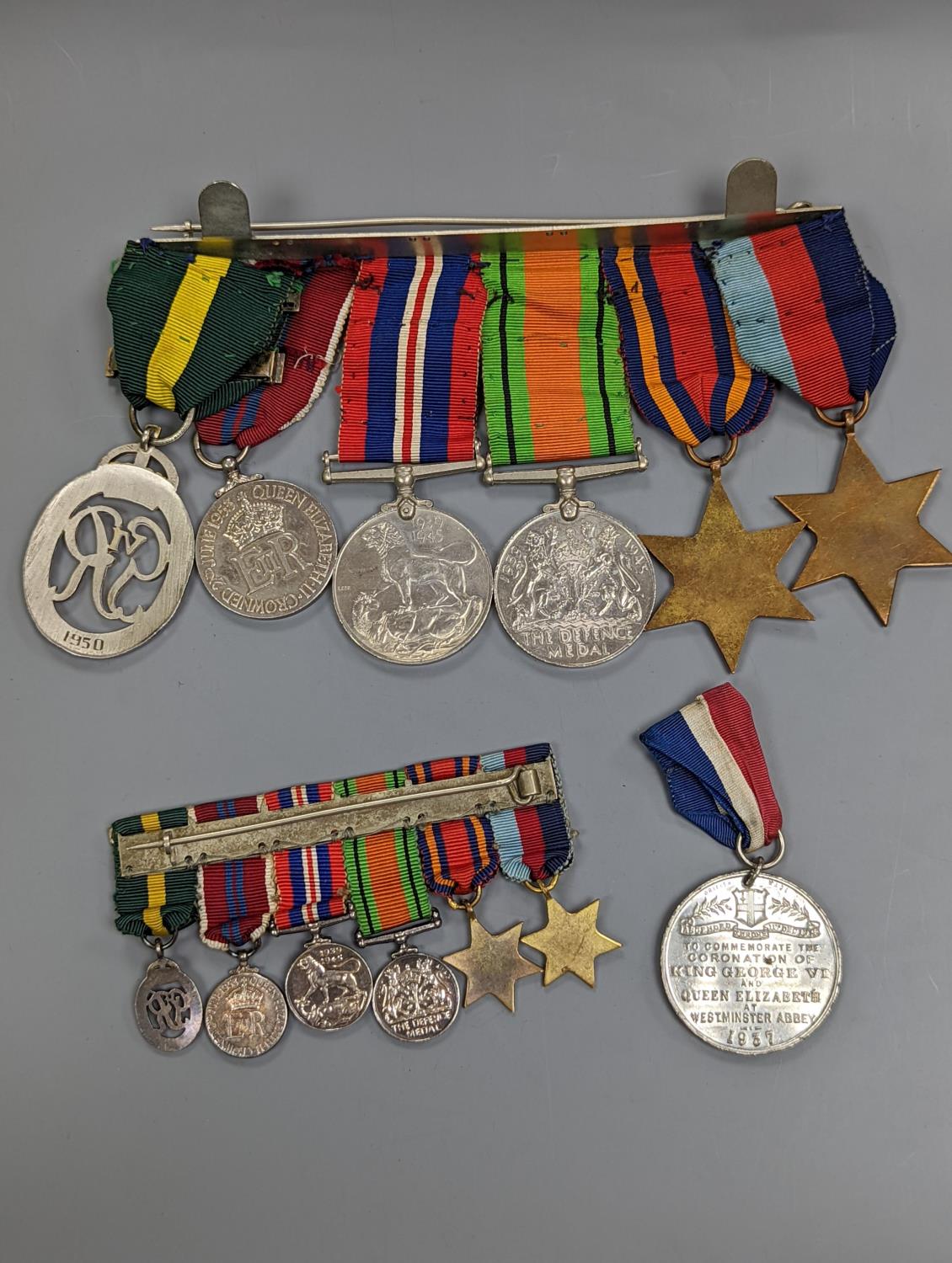 A WWII medal group of six, with miniatures, and a royal commemorative medal, 1937 - Image 8 of 15