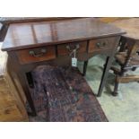 A George III mahogany side table with three drawers, width 75cm, depth 44cm, height 72cm