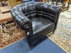 A black leather tub framed club armchair, width 88cm, depth 76cm, height 76cm