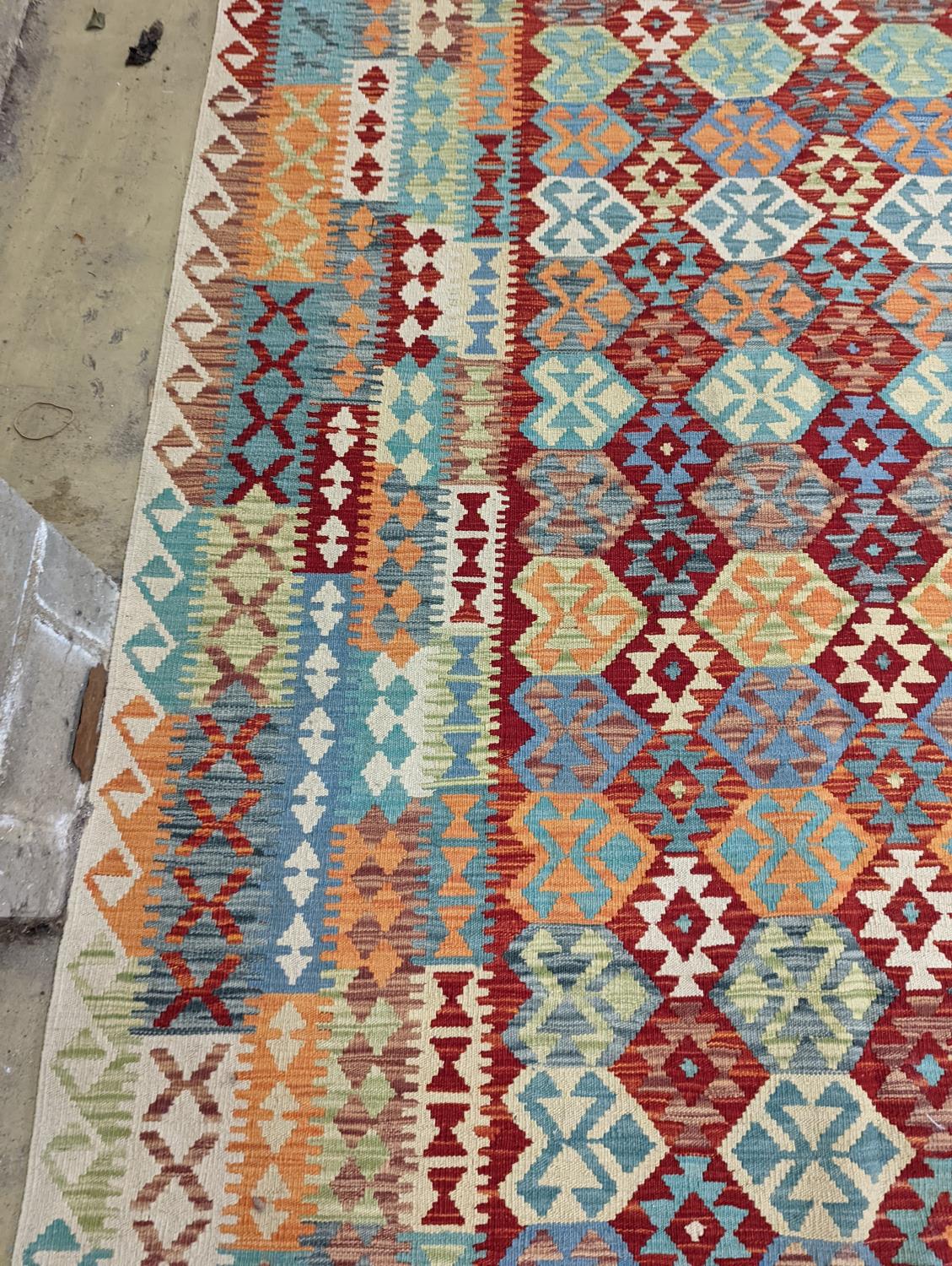 An Anatolian Kilim flatweave carpet, 390 x 300cm - Image 3 of 10