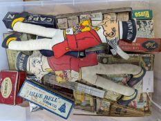 A large collection of advertising boxes, tins etc