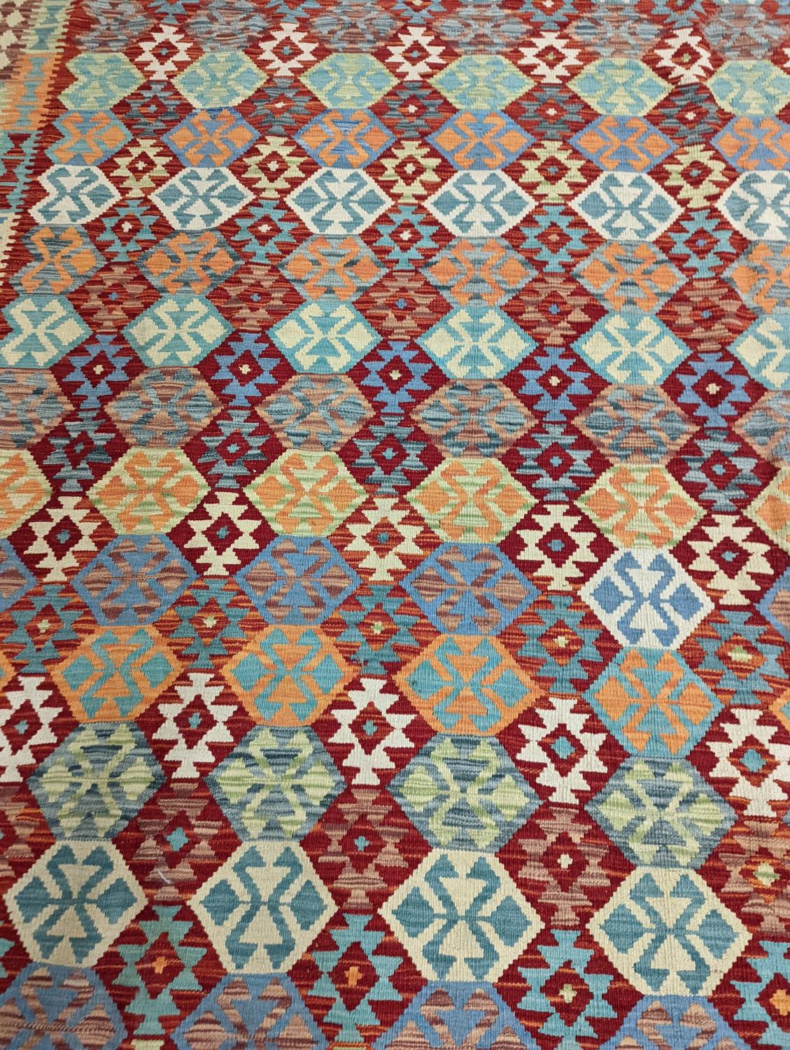 An Anatolian Kilim flatweave carpet, 390 x 300cm - Image 6 of 10