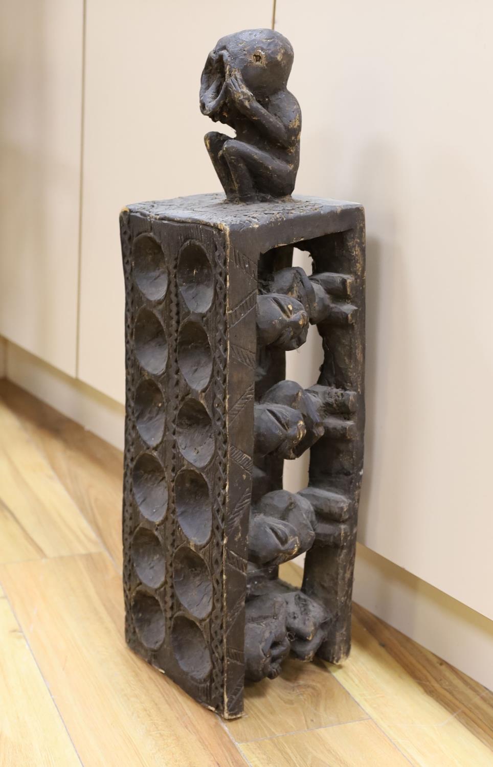 A large Nigerian carved wood amusement, 72 cms high. - Image 2 of 2