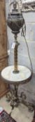 A late Victorian cast brass and onyx oil lamp standard, the column with an alabaster mid tier,