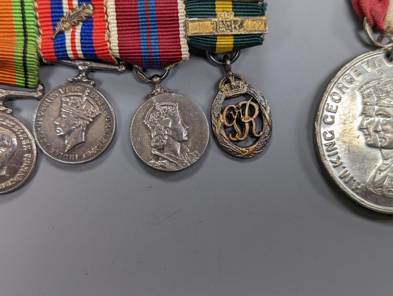 A WWII medal group of six, with miniatures, and a royal commemorative medal, 1937 - Image 6 of 15