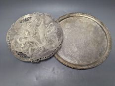 A Persian engraved white metal circular drink's tray by Vartan, 32cm, 747 grams and a white metal