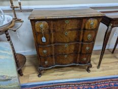 An early 20th century Queen Anne revival banded walnut shaped front chest, width 77cm, depth 46cm,