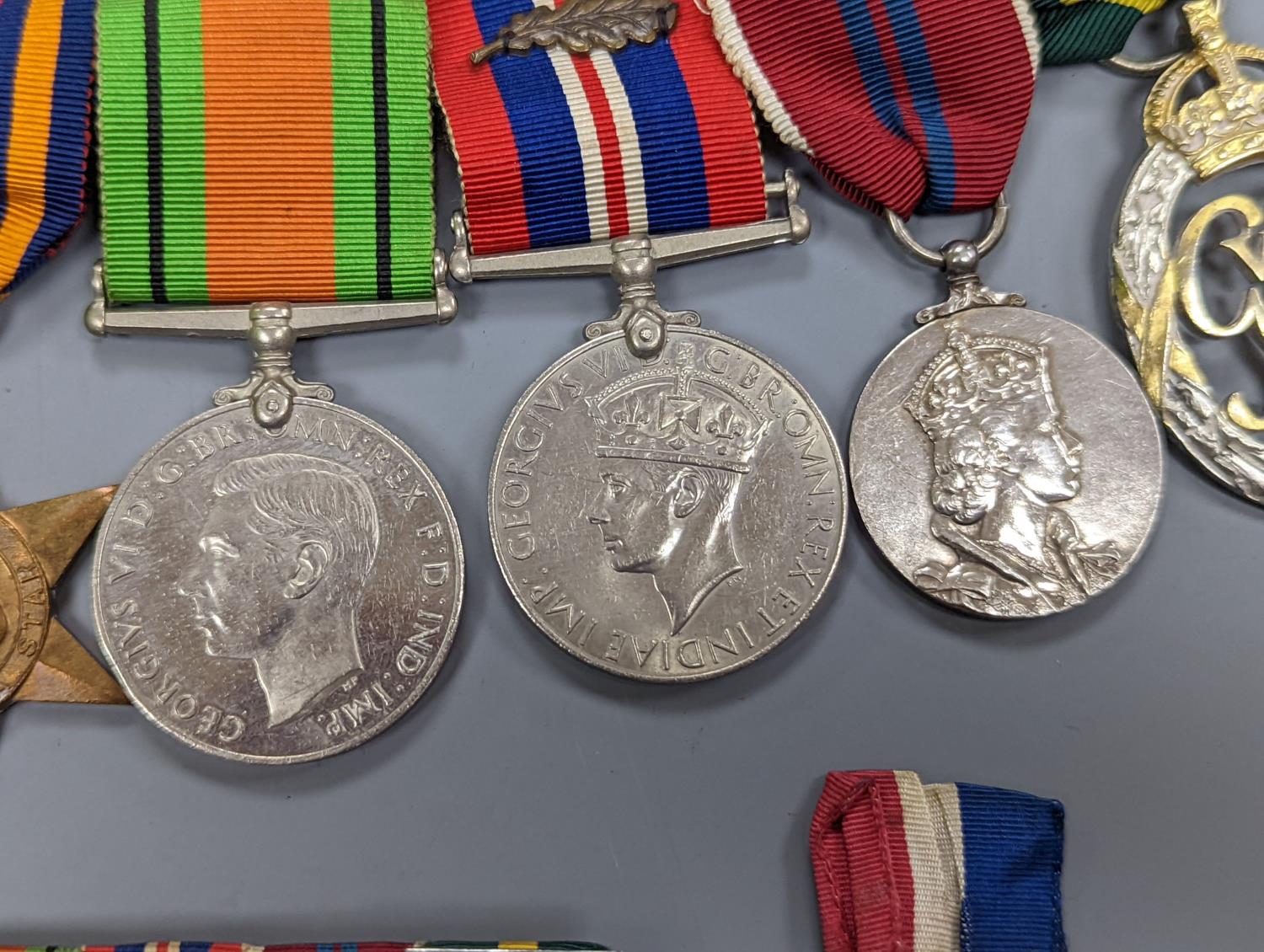 A WWII medal group of six, with miniatures, and a royal commemorative medal, 1937 - Image 3 of 15