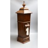 A reproduction country house post box, 63 cms high.