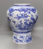 A large blue and white Delft vase, 44 cms high.